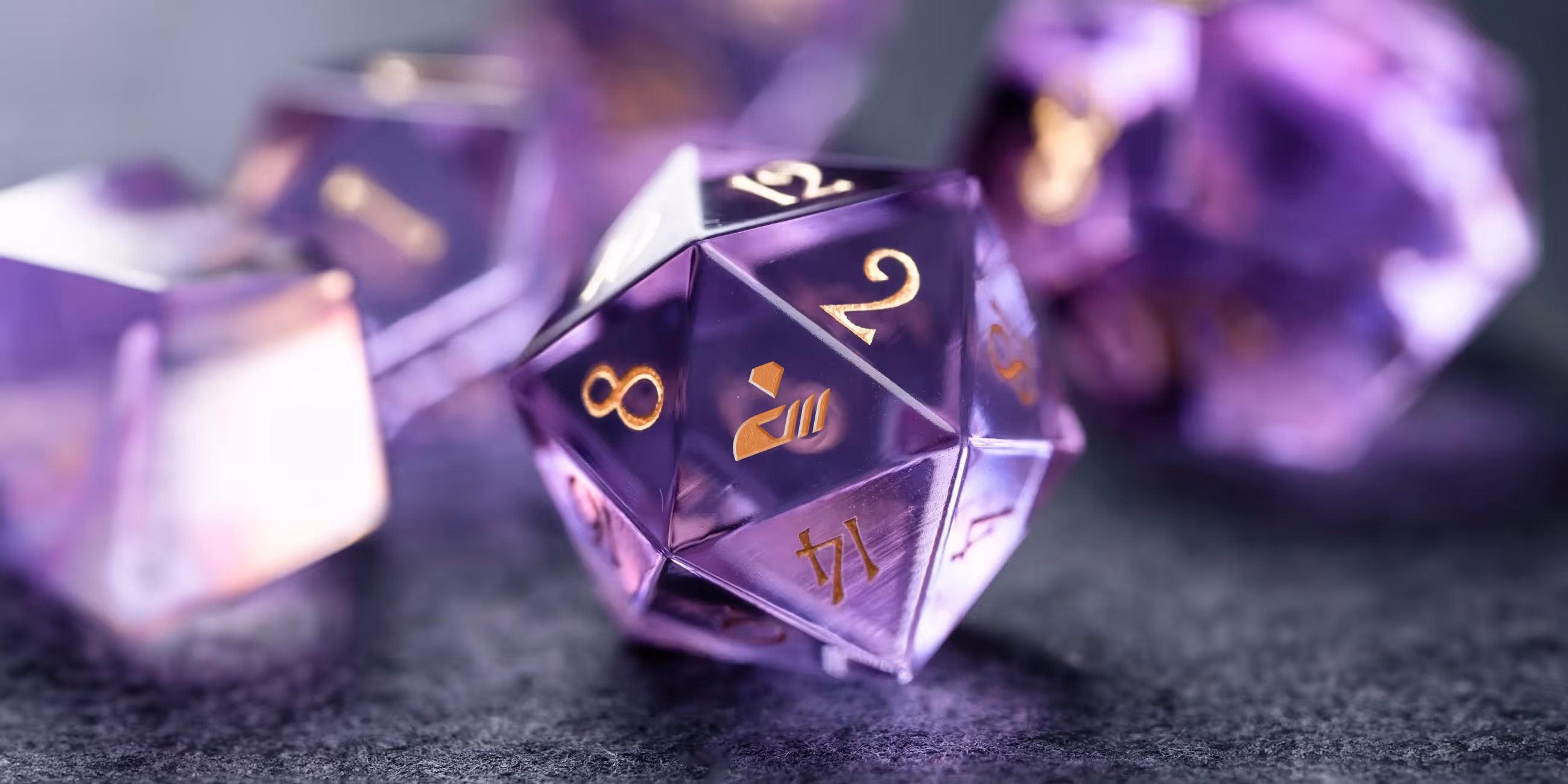 Purple translucent 20-sided die with gold numbers resting on a dark surface, surrounded by other blurred dice.
