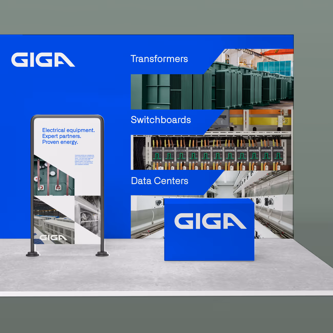 GIGA booth with blue backdrop showing transformers, switchboards, data centers, and a display panel.